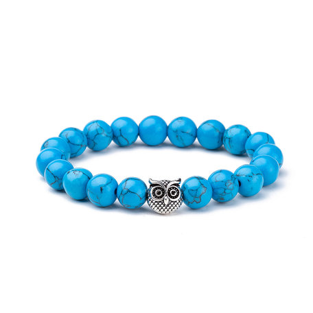 KRALEN ARMBAND BLUE HOWLIET MET UIL BEDELTJE